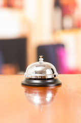 hotel bell at reception desk