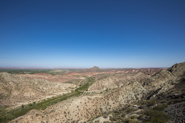 Desert, mountain and blue sky in Ischigualasto, Argentina