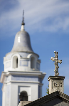 Detail of grave in la Recoleta Cemetery with blue sky