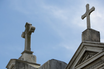 Fototapeta na wymiar Detail of grave in la Recoleta Cemetery with blue sky