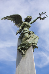 Detail of grave in la Recoleta Cemetery with blue sky