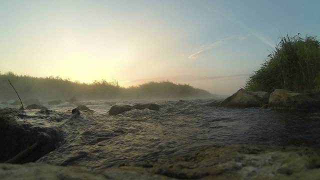 Dawn over Rushing river timelapse
