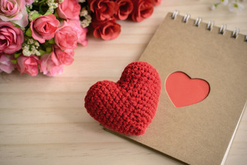 Blank notepad with flower and red heart shape