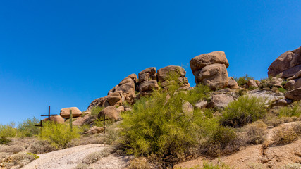 Three Crosses on a hillside in the desert near the village of Carefree in Arizona on a hot summer...