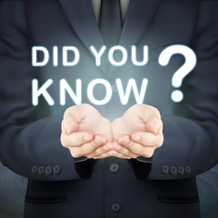 businessman holding did you know words