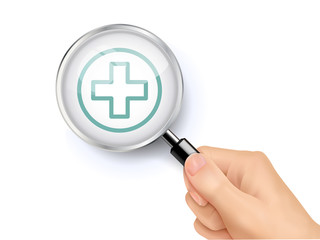 medical icon showing through magnifying glass