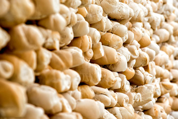 Background texture of stacked bread rolls
