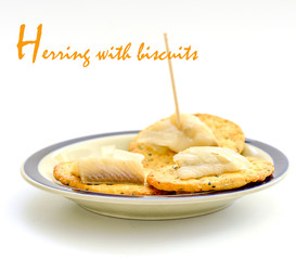 pickled herring on crisp bread, cold appetizer