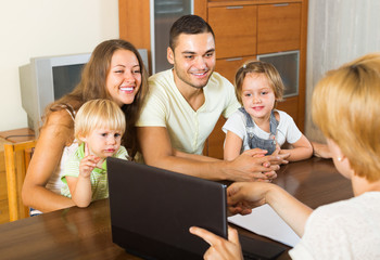 Family with insurance agent