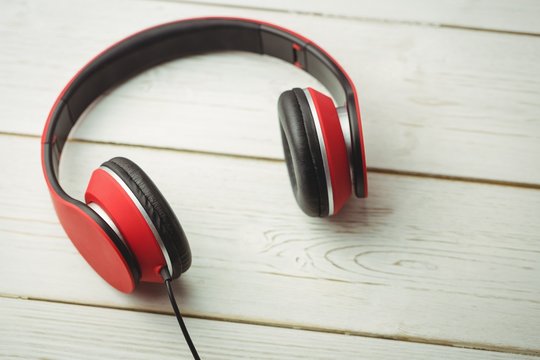 headphones on a wood desk