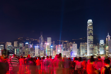 Many people watching the light show in Hong Kong at night