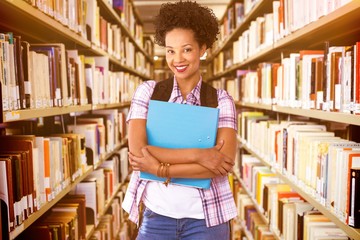 Composite image of casual young woman with folder in office