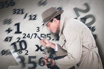 Composite image of spy looking through magnifier