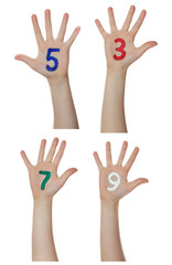 Numbers painted on children hands.  Rises up hands. 