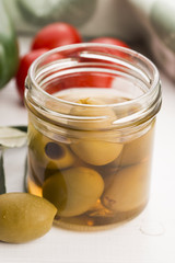 pickled olives and olive tree branch