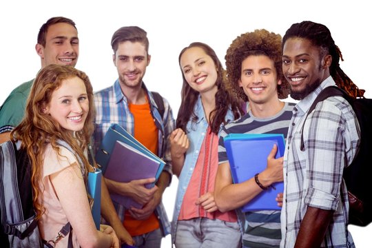 Composite image of smiling group of students holding folders