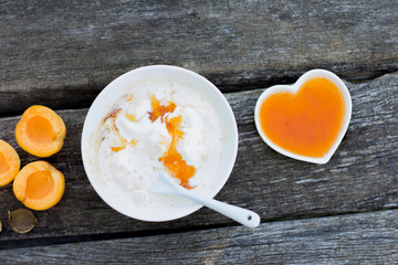 Homemade ice cream wiht apricots.