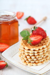 Waffles, mint and ripe strawberries