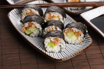Sushi - Salmon rolls served on a plate