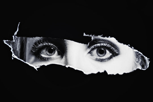 Women's blue eyes spying