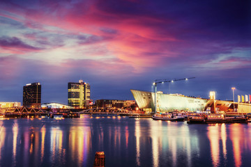 Fototapeta premium Beautiful night in Amsterdam. Night illumination of buildings an