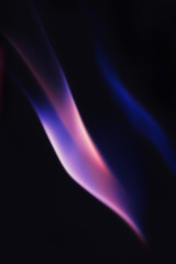 Obraz premium Abstract colorful smoke on a black background