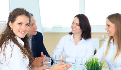 business woman with her staff, people group in background 