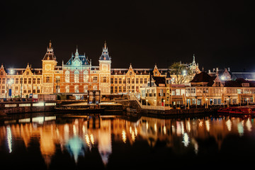 Fototapeta na wymiar Beautiful night in Amsterdam. Night illumination of buildings an