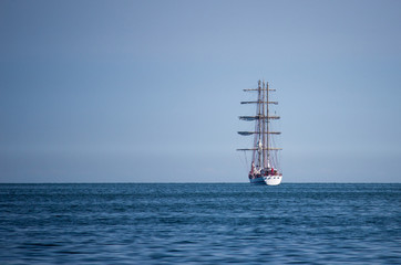 Fototapeta na wymiar ship departs from a port in the sea.