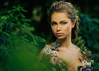 Elf woman in a magical forest