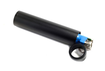 external battery in a black metal cylinder