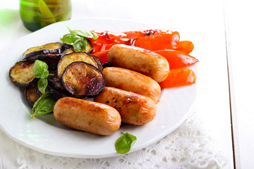 Roasted sausages, aubergine and  pepper