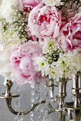 Floral arrangement with pink peonies, white chrysanthemums and g