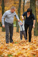 happy family in autumn park