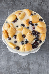 Blueberry and blackberry cheesecake with ladyfingers