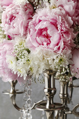 Floral arrangement with pink peonies, white chrysanthemums and g