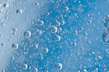 Macro Oxygen bubbles in blue clear water