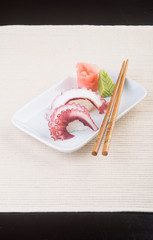 japanese cuisine. sushi octopus on the background
