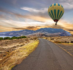 Mountain road, Madeira, Portugal. Hot air balloon