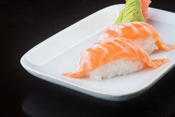 japanese cuisine. sushi salmon on the background