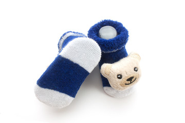 Blue baby socks isolate on white background.