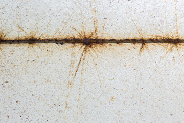 Close up rusty on the steel and dirty white terrazzo floor