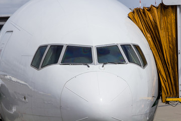 Commercial airplane loading at the airport