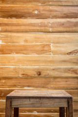 Empty top wooden table and wooden wall background