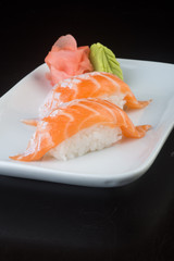 japanese cuisine. sushi salmon on the background
