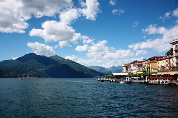 Bellagio lakefront on the shores of Lake Como under blue sky in Lombardy Italy 