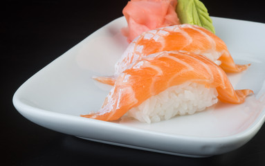 japanese cuisine. sushi salmon on the background