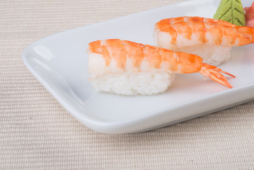 japanese cuisine. sushi shrimp on the background