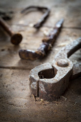 Old rusty tools in the workshop