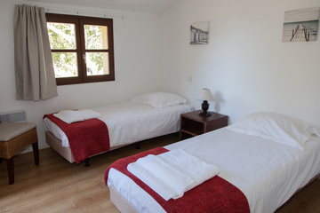 Two single beds in a cosy cottage